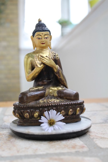 Lille fredsommelig Buddha